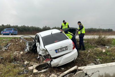 Bursa'da kontrolden çıkan araç tarlaya uçtu: 2 yaralı